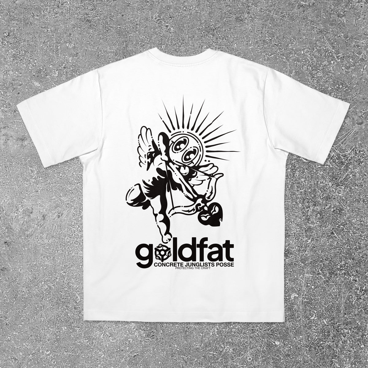 White t-shirt with black graphic design and 'goldfat' branding on a gray surface