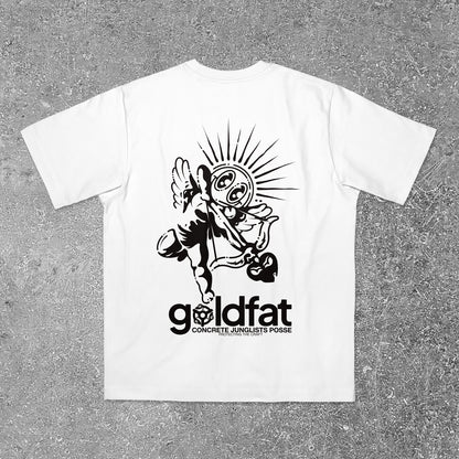 White t-shirt with black graphic design and 'goldfat' branding on a gray surface
